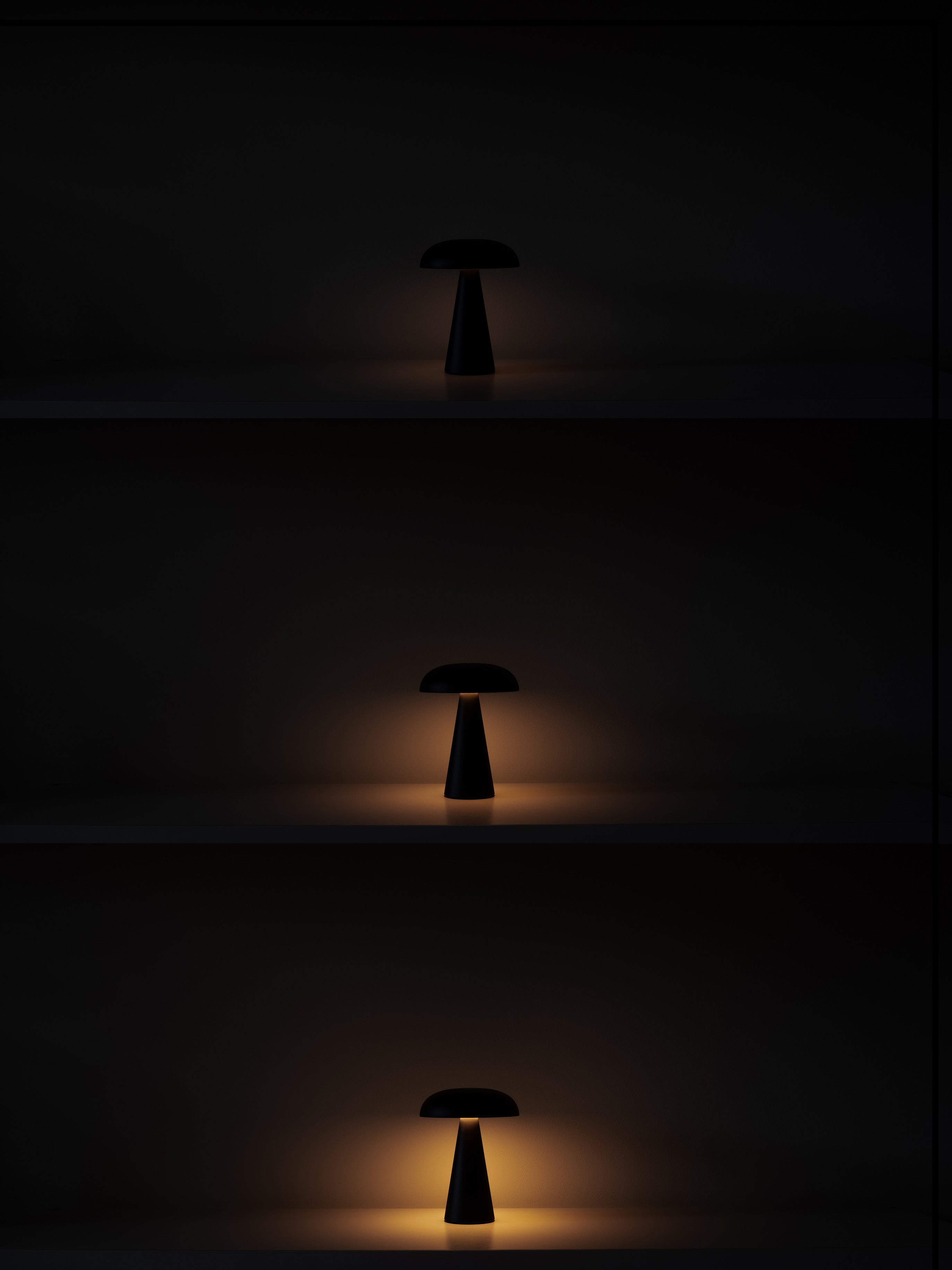 Reverie lamp showing three lighting levels in dark interior